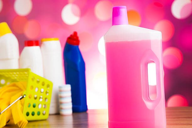 Assorted cleaning products, home work colorful theme