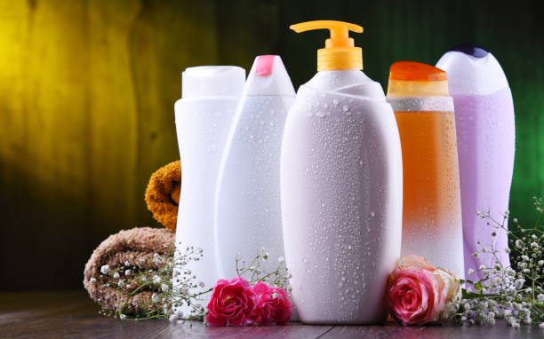 Plastic bottles of body care and beauty products.